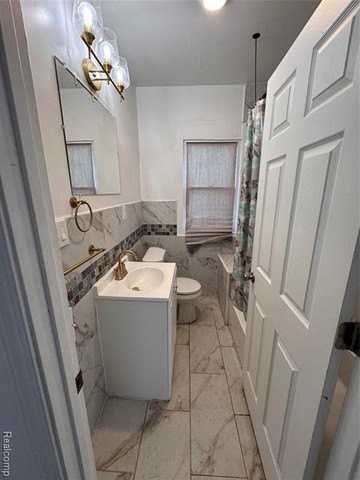 8569 Quincy St - Photo 7 of 15