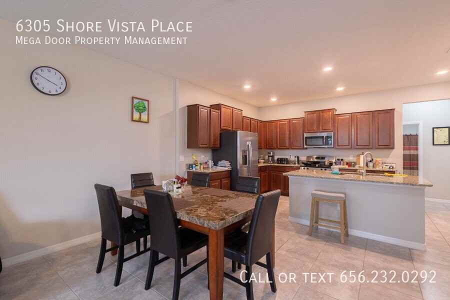 6305 Shore Vista Pl - Photo 4 of 25