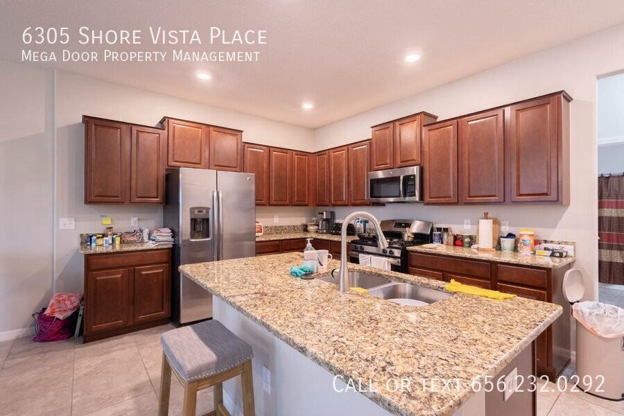 6305 Shore Vista Pl - Photo 5 of 25