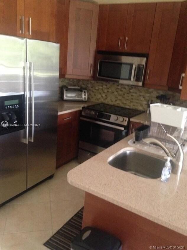 901 Lyons Rd #1208 - Photo 5 of 15