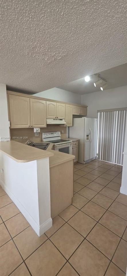 7475 W 22nd Ave #206 - Photo 2 of 30