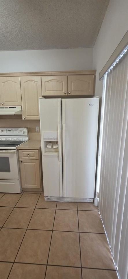 7475 W 22nd Ave #206 - Photo 4 of 30