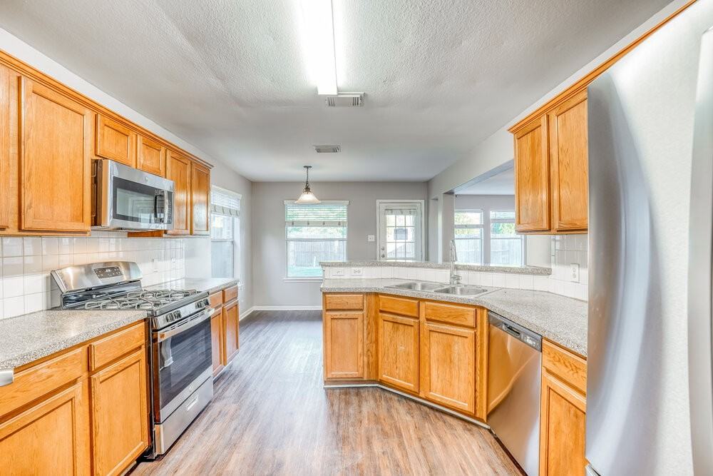 9702 Winter Bloom Ln - Photo 7 of 17