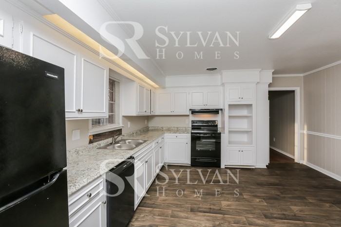 5819 Kings Pl - Photo 5 of 16