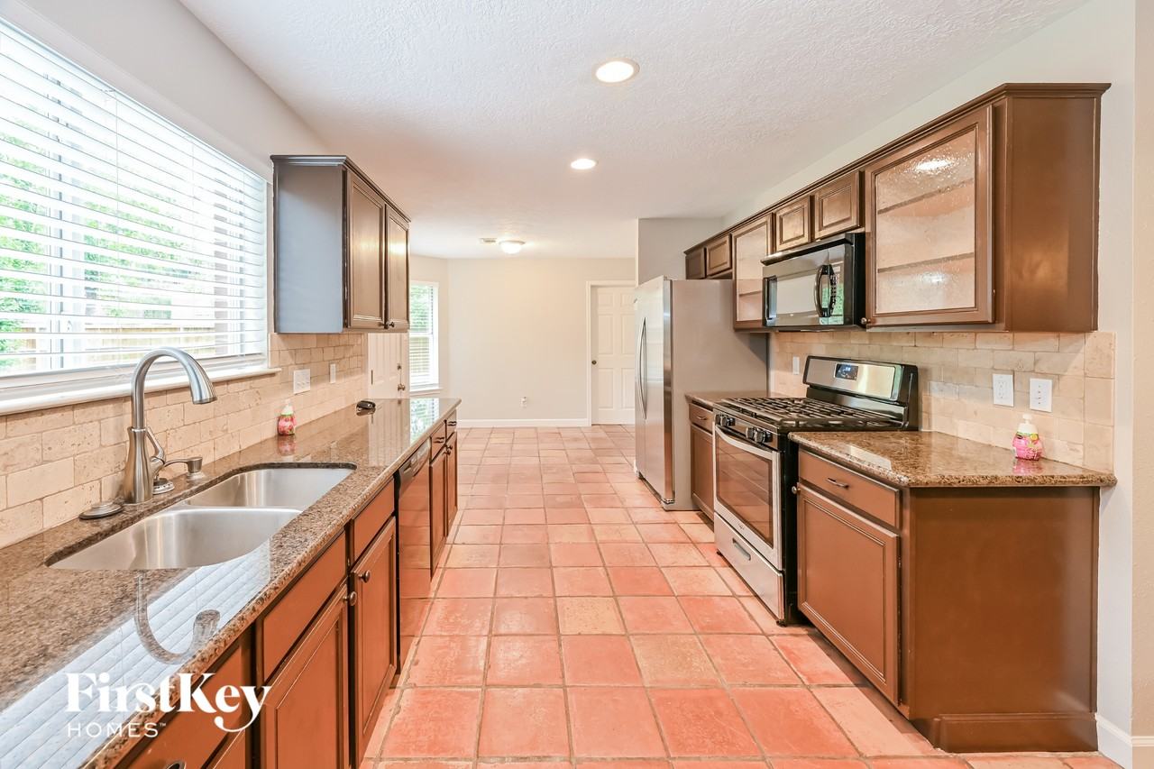 1402 Green Tree Dr - Photo 4 of 13