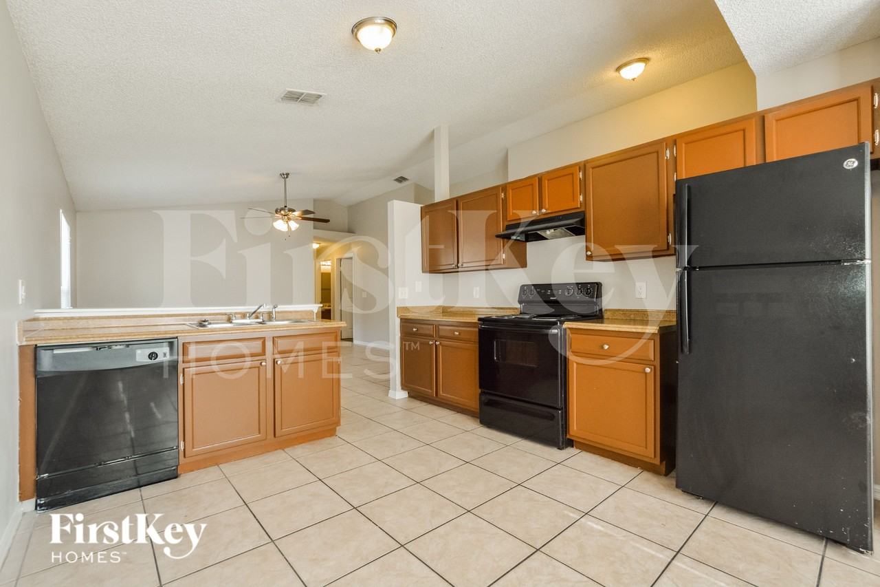 7571 Groveoak Dr - Photo 5 of 16