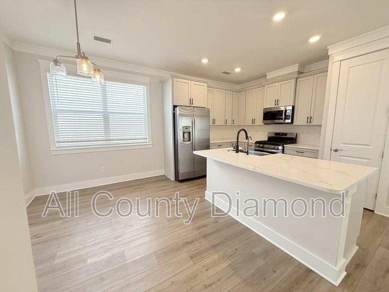 841 Breakfast Point Blvd - Photo 3 of 37