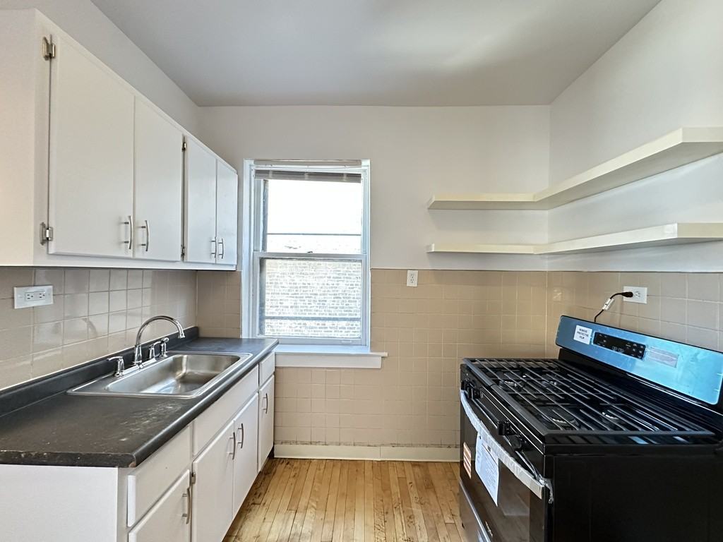 7147 S Constance Ave #2E - Photo 3 of 21