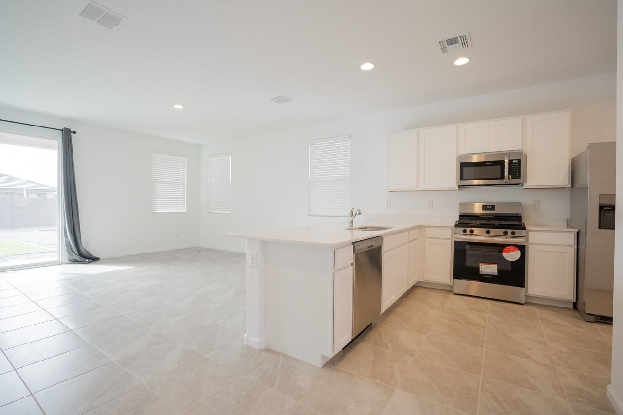 12517 W Luxton Ln - Photo 5 of 30