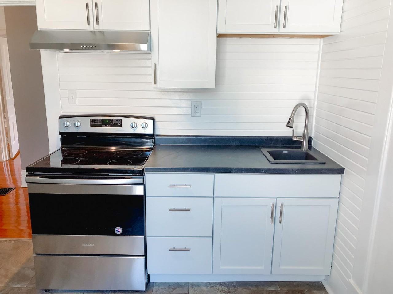 319 W 3rd St - Photo 2 of 7