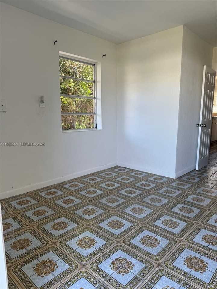 3690 Sw 14th St #1 - Photo 3 of 13