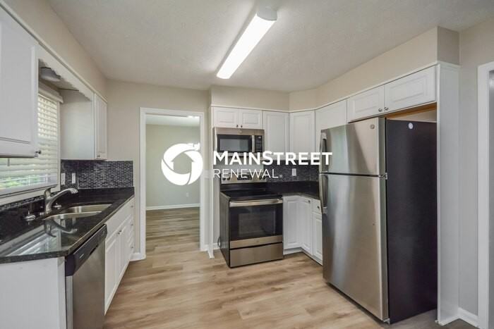 6950 Carleen Ct - Photo 7 of 17