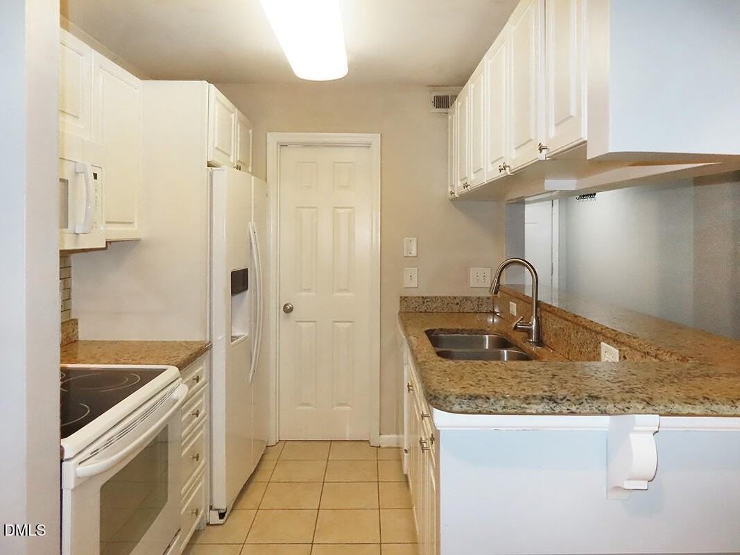 1003 Kingswood Dr Apt J #J - Photo 5 of 10