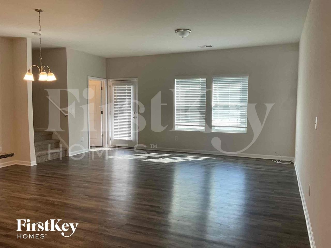 10743 Rivergate Dr Nw - Photo 2 of 9