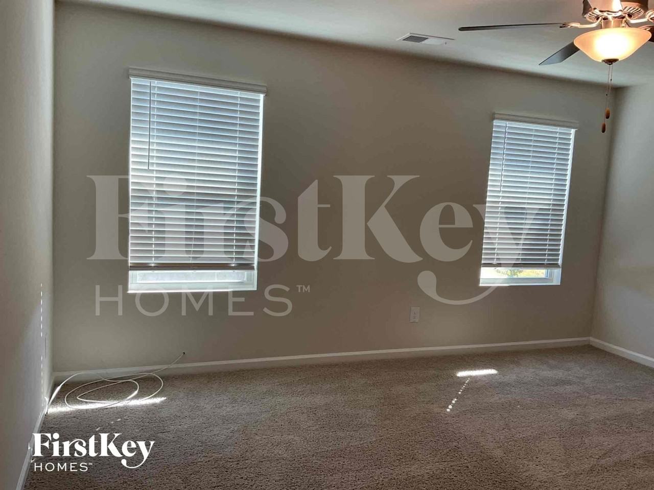 10743 Rivergate Dr Nw - Photo 4 of 9