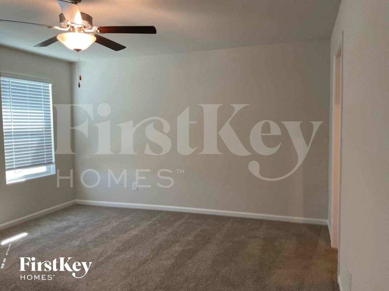 10743 Rivergate Dr Nw - Photo 5 of 9