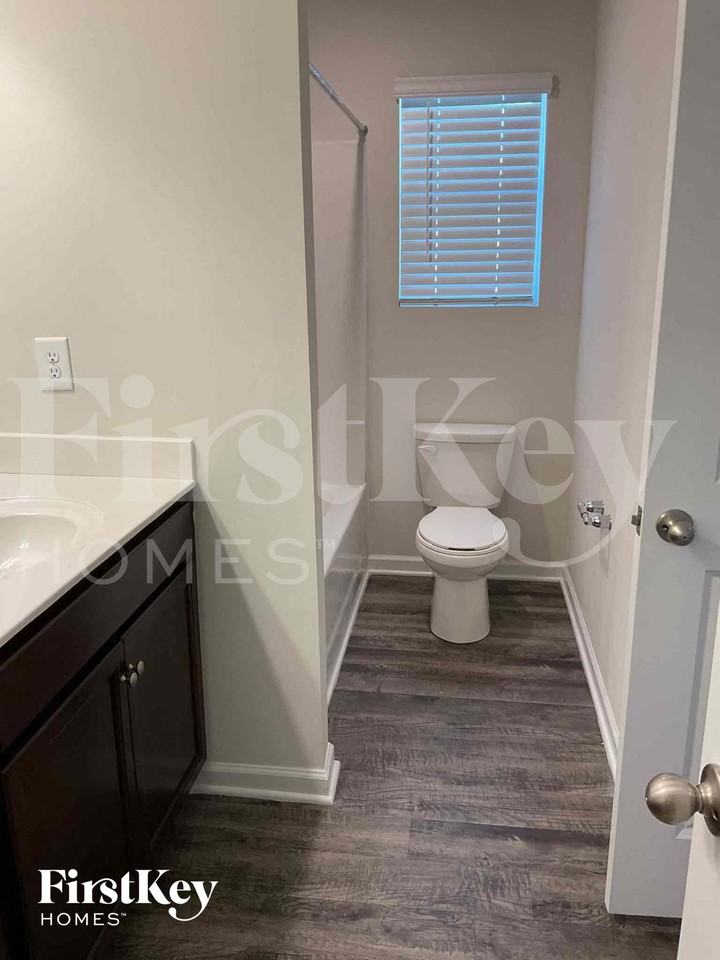 10743 Rivergate Dr Nw - Photo 7 of 9