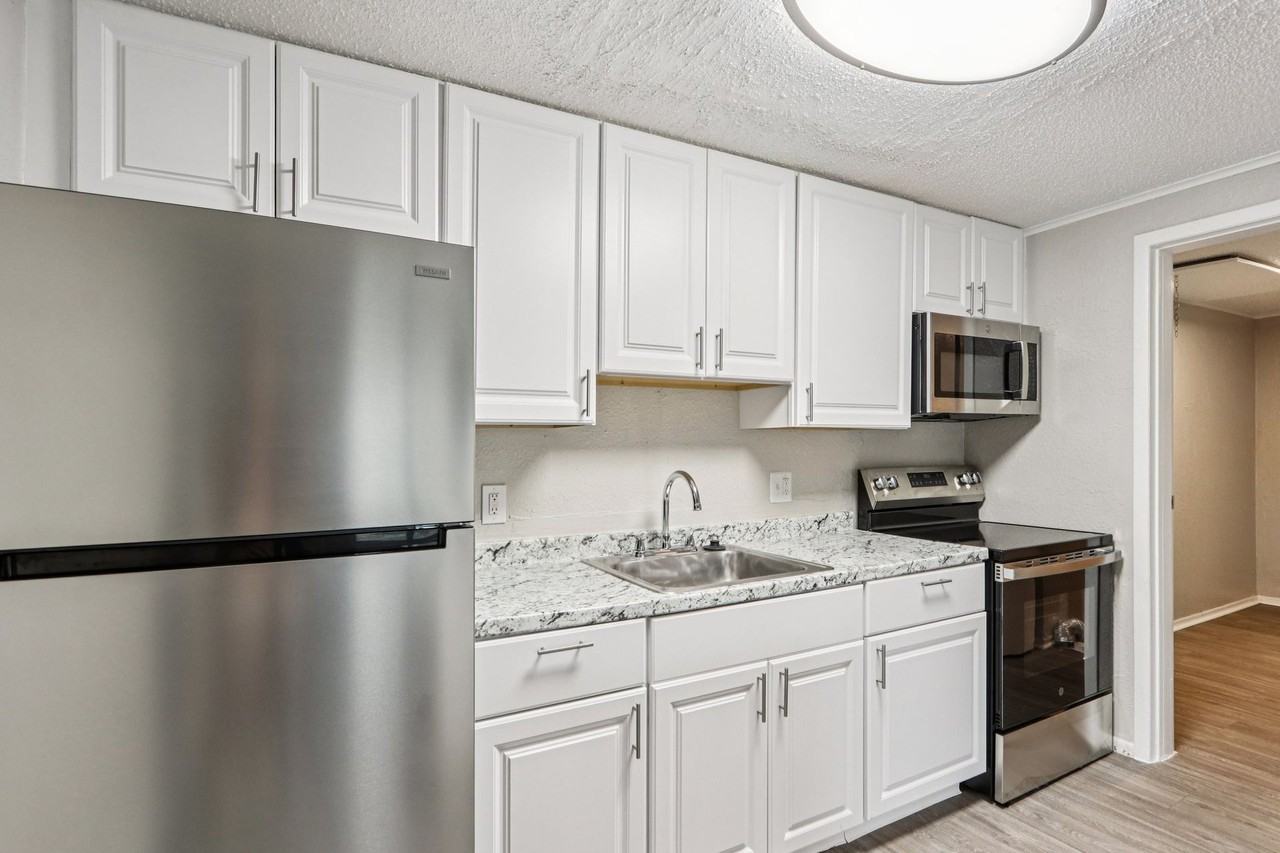 Summer Glen ~ Boutique Cottage Style Living Meets Hassle Free Leasing - Photo 4 of 14