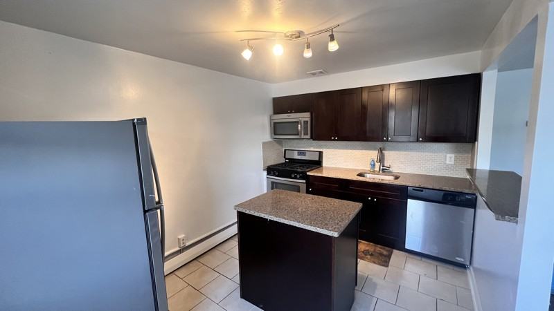 1332 Faunce St #2ndFL - Photo 2 of 13