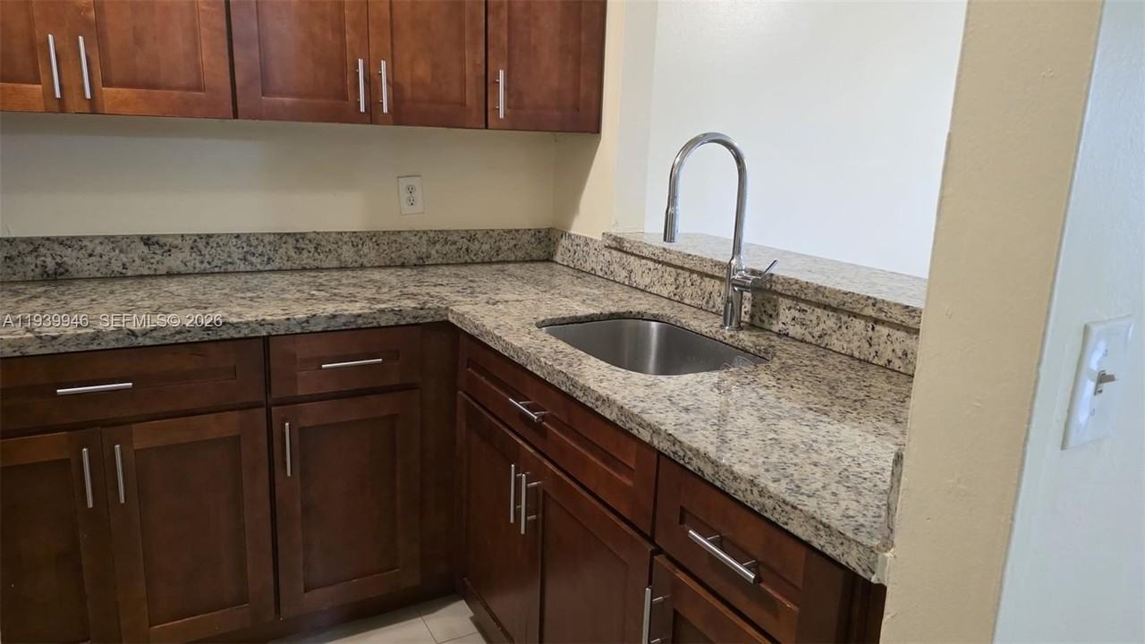 15304 Sunset Dr #28-14 - Photo 4 of 12