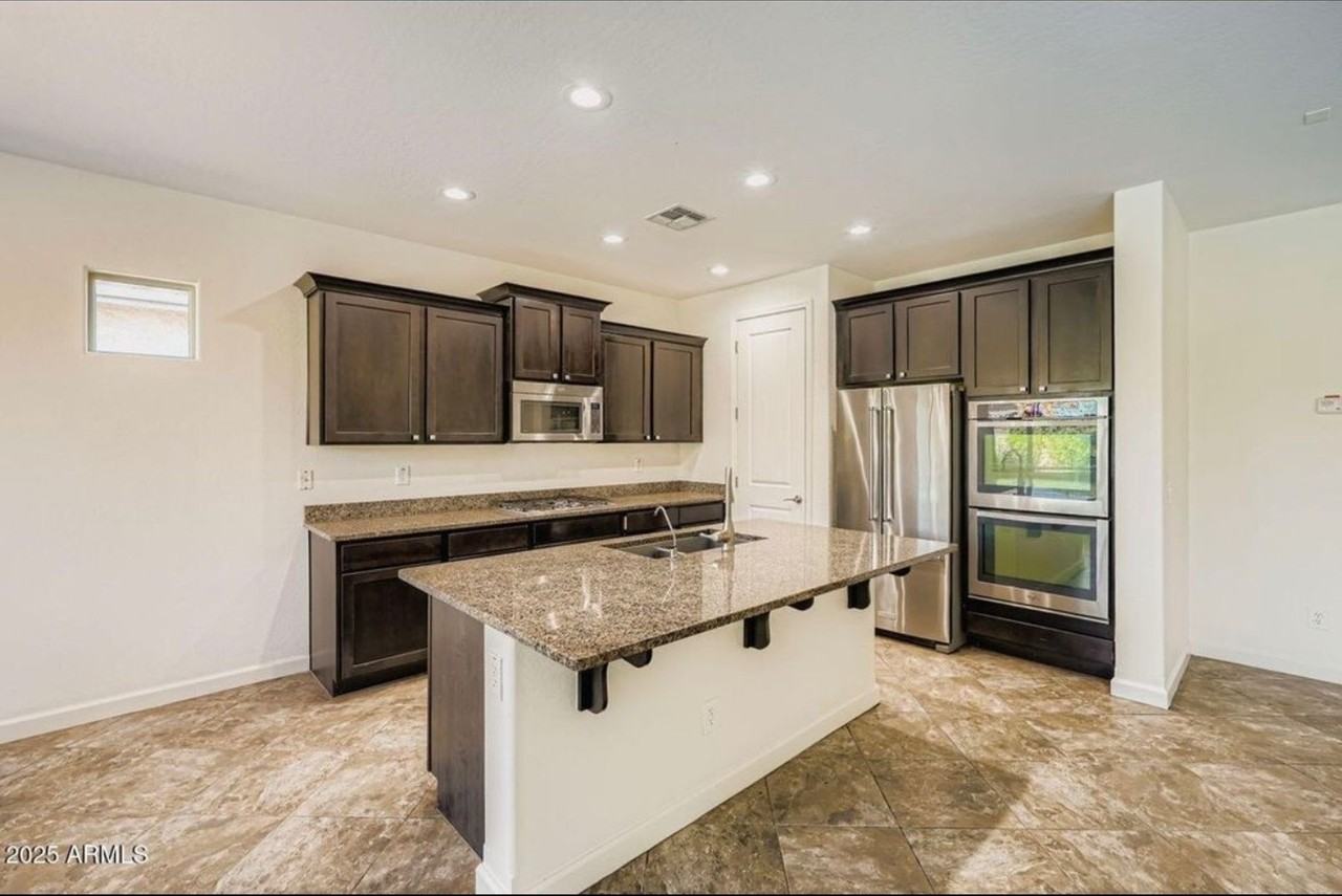 10824 E Quintana Ave - Photo 2 of 9