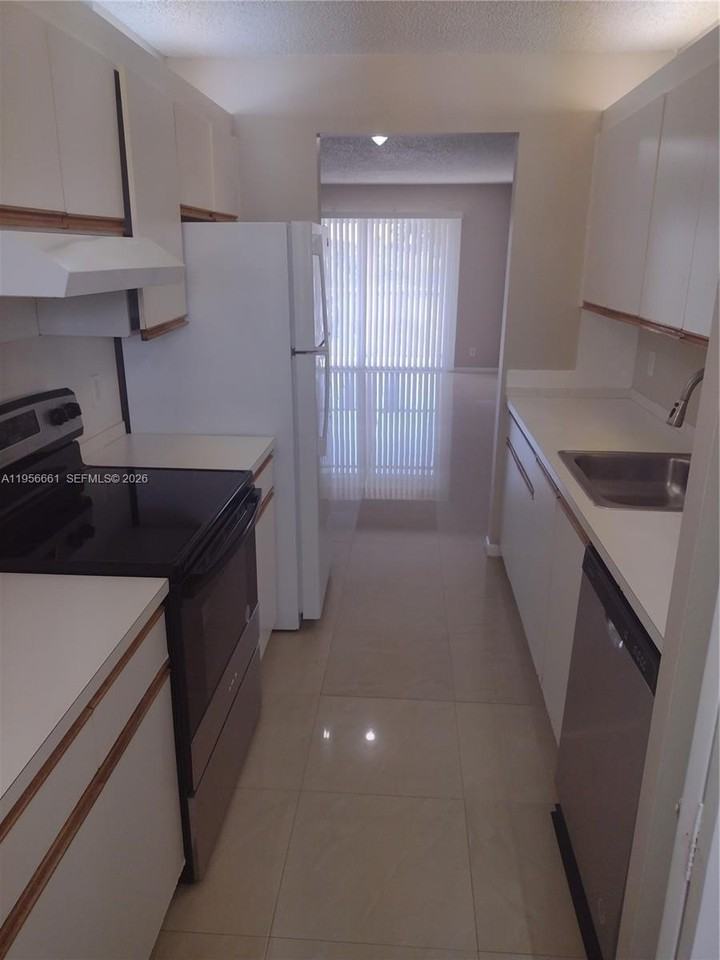 1200 Sw 130th Ave #409G - Photo 3 of 13