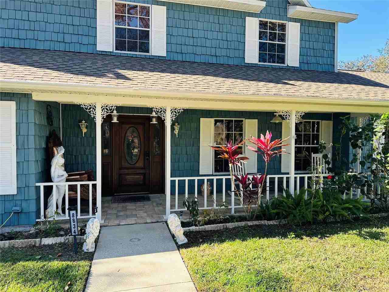 8834 Whispering Oaks Trl - Photo 4 of 37