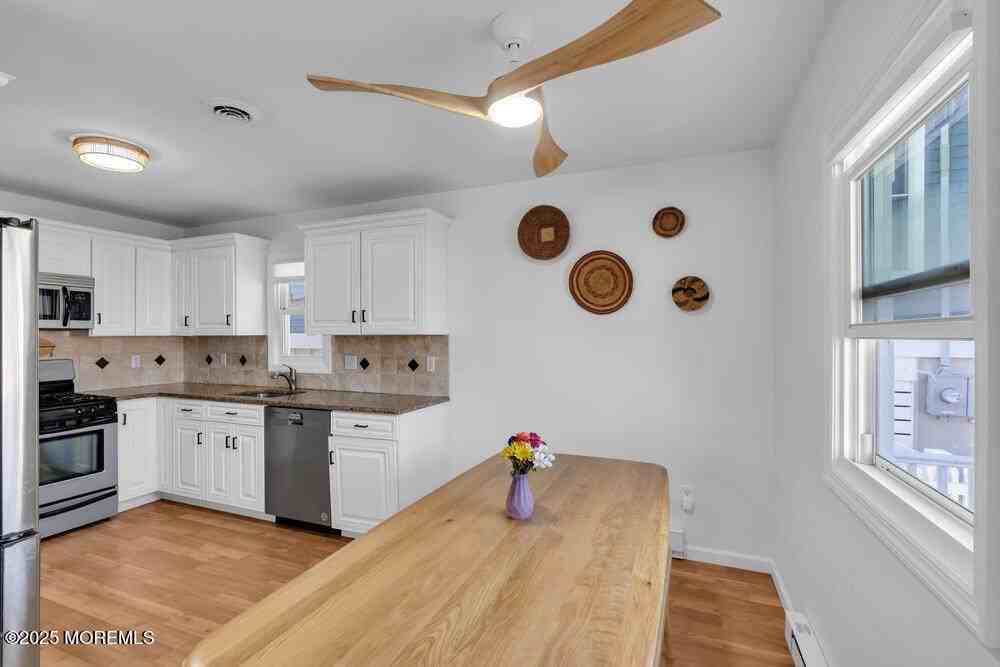 234 3rd Ave - Photo 7 of 25