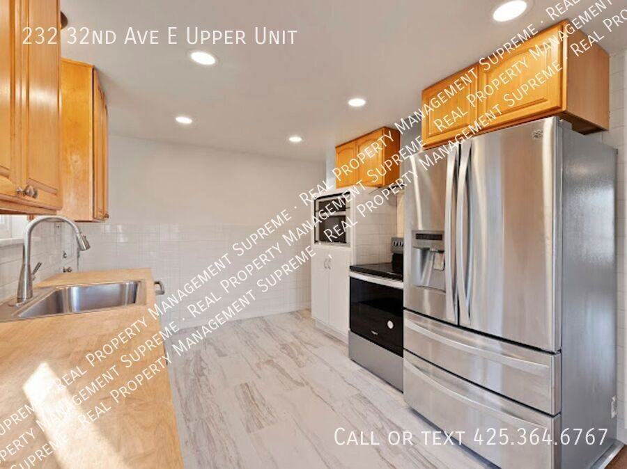 232 32nd Ave E Uppr Unit #Unit - Photo 5 of 13