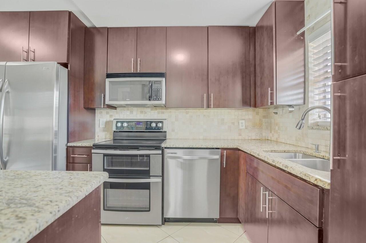 9851 Sandalfoot Blvd #9851-207 - Photo 4 of 27