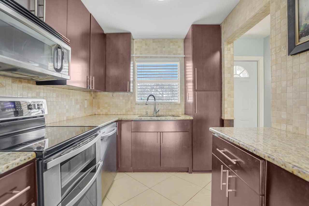 9851 Sandalfoot Blvd #9851-207 - Photo 7 of 27