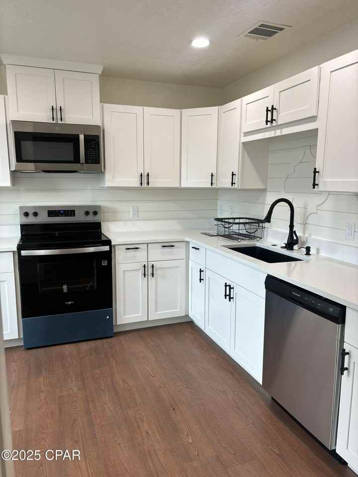 2809 Lagoon Knoll Drive #2809B - Photo 3 of 13