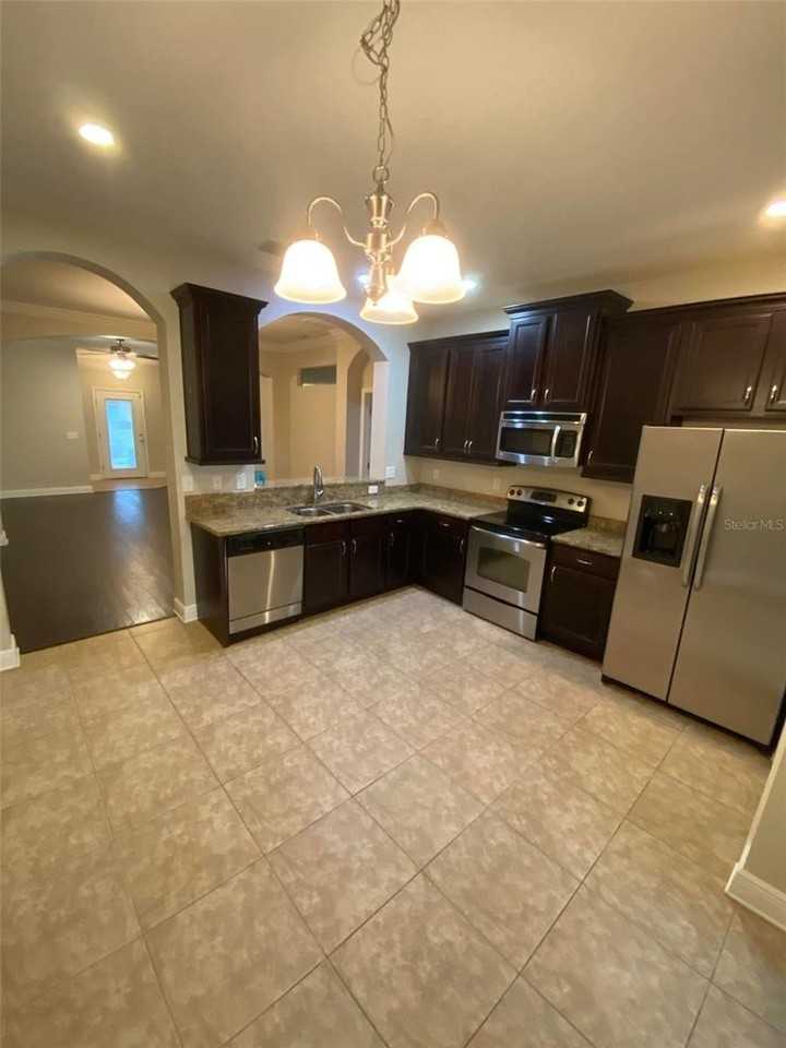 6934 Frog Pocket Pl - Photo 2 of 6