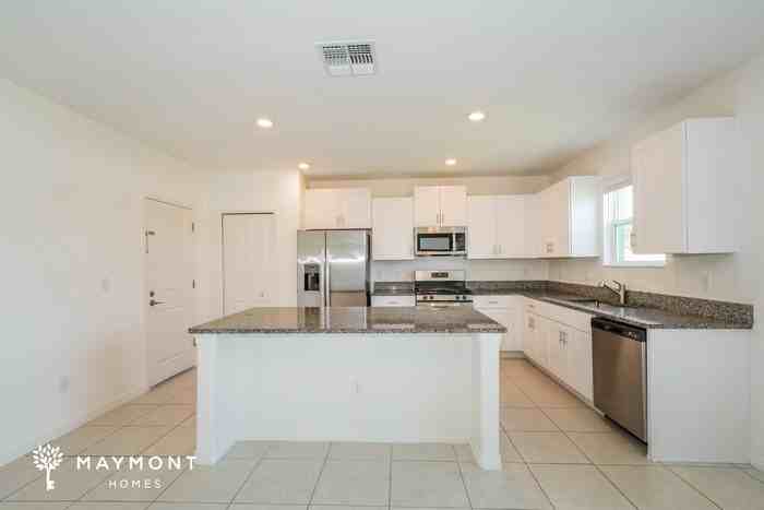 8530 41st Ave E - Photo 5 of 13