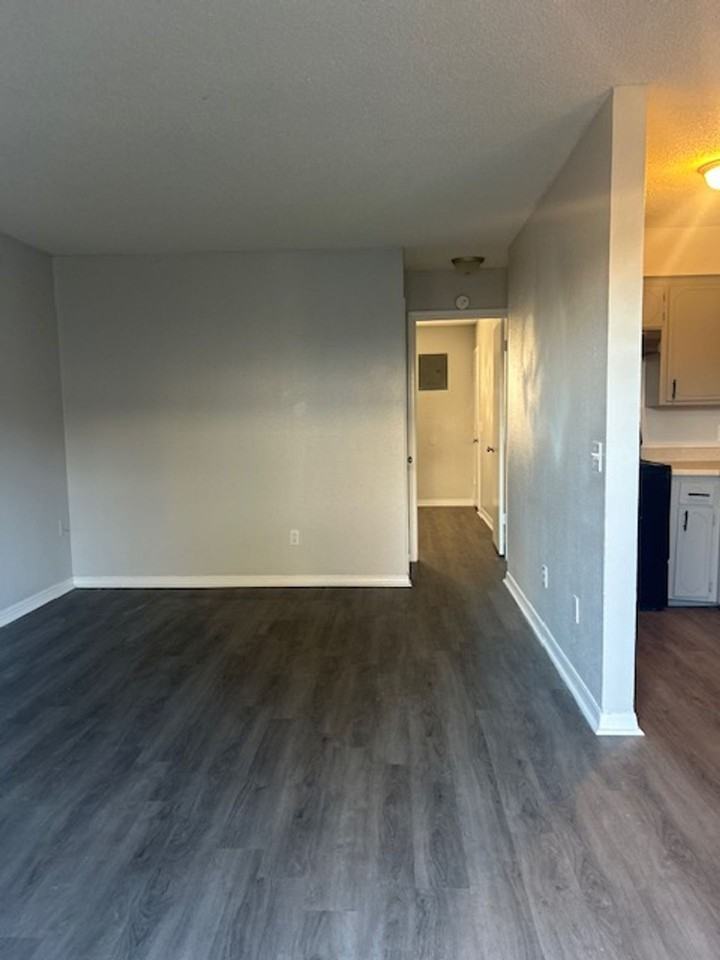 HARMONY APARTMENTS - Photo 3 of 11