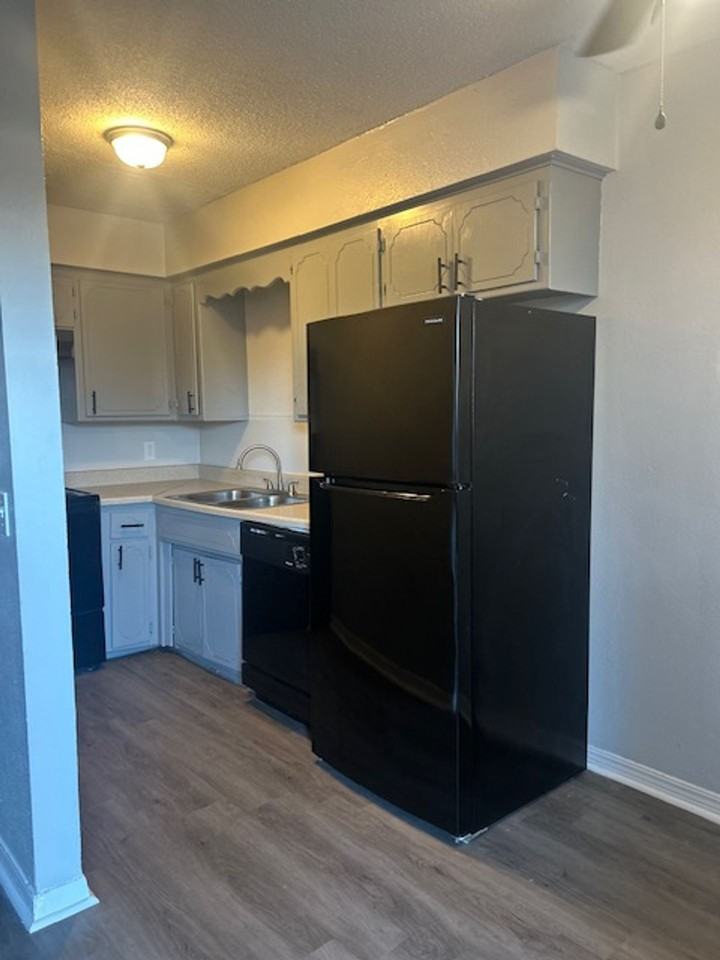 HARMONY APARTMENTS - Photo 4 of 11