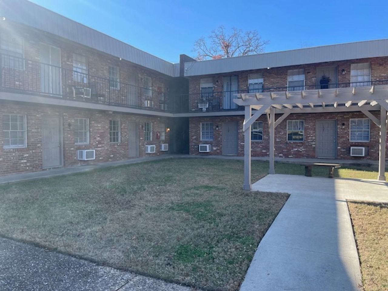 HARMONY APARTMENTS - Photo 2 of 11