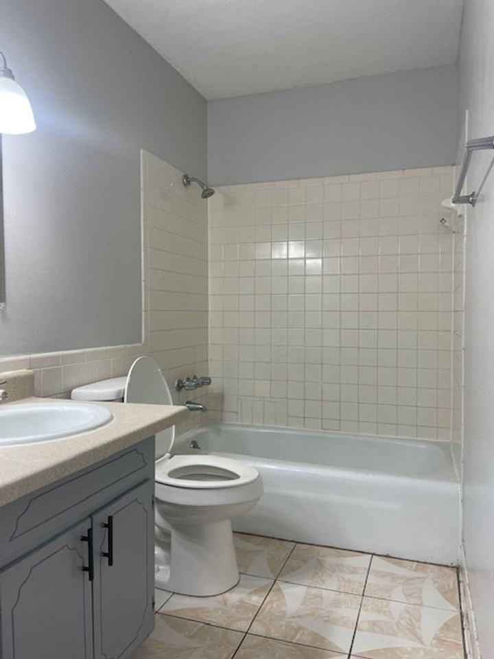 HARMONY APARTMENTS - Photo 5 of 11