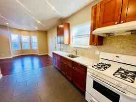 Tran 59th Triplex - Photo 1 of 1