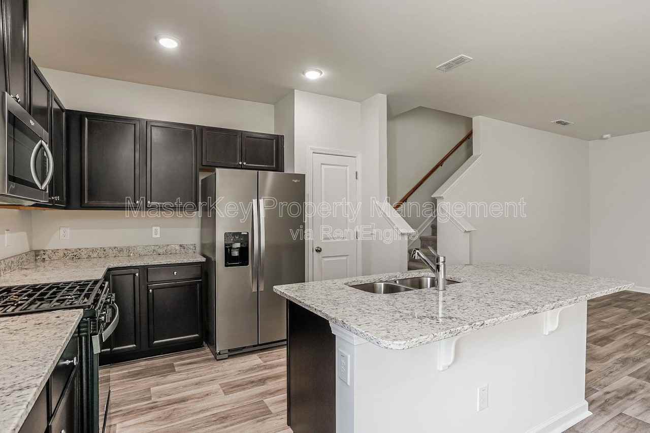 1102 Carpenter Falls Ave - Photo 4 of 28