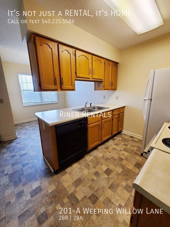 201 Weeping Willow Ln Apt A - Photo 5 of 13