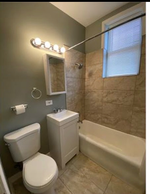 7700 S Cornell Ave - Photo 7 of 10