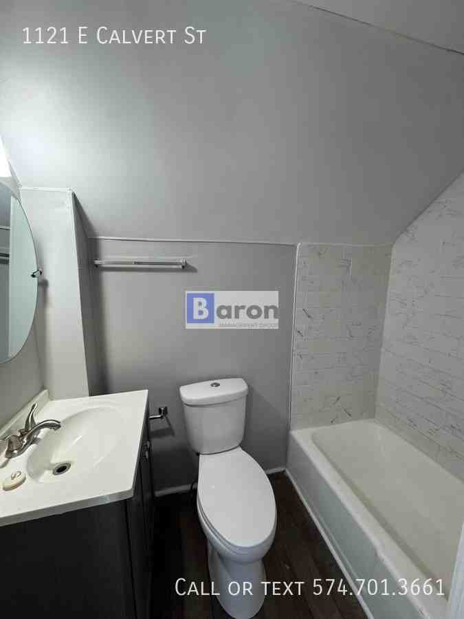 1121 E Calvert St - Photo 4 of 13