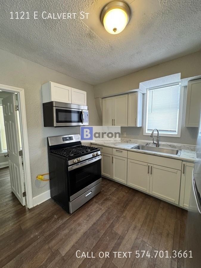 1121 E Calvert St - Photo 5 of 13