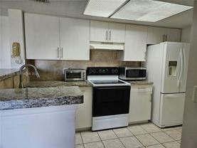 5011 Wiles Rd #306 - Photo 1 of 1