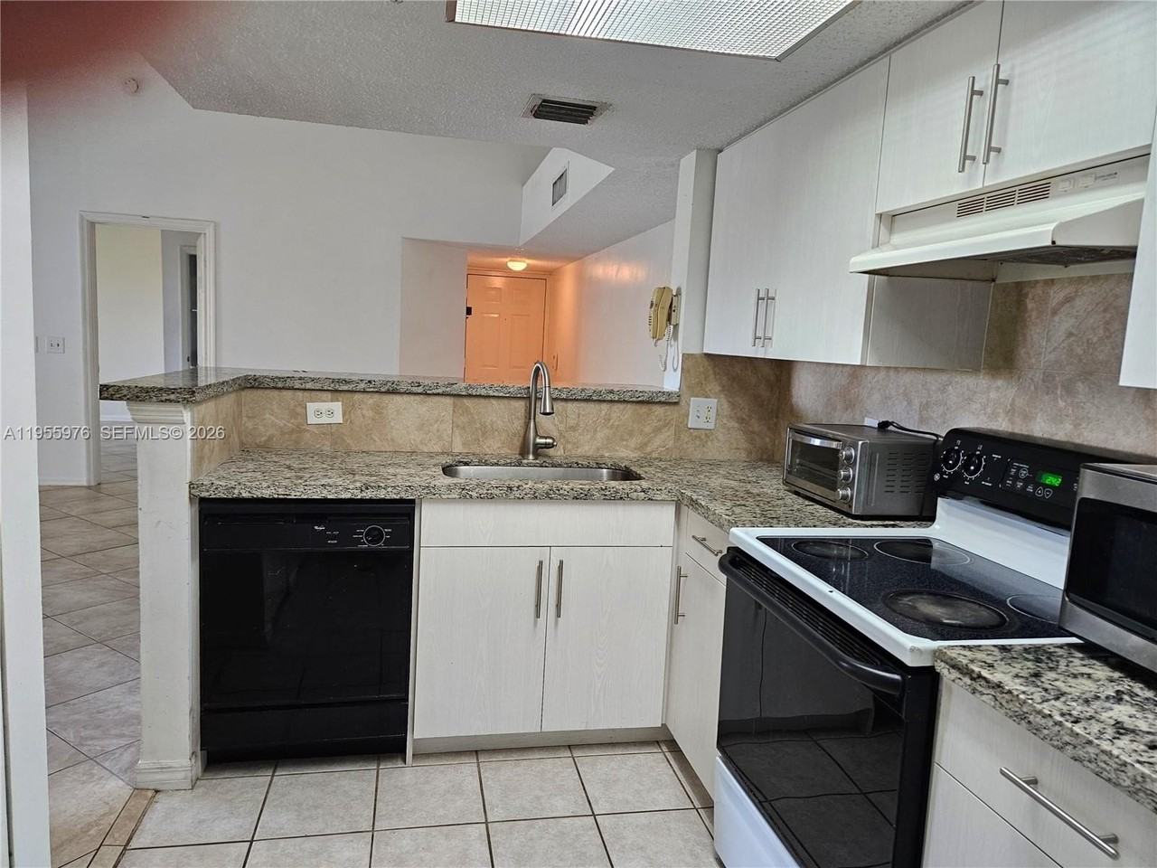 5011 Wiles Rd #306 - Photo 5 of 17