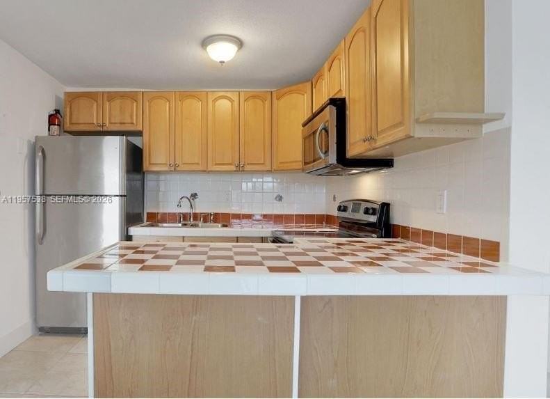 4275 Nw South Tamiami Canal Dr #2-310 - Photo 2 of 9