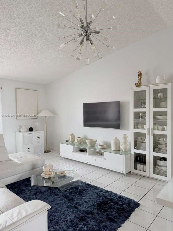 10017 W Okeechobee Rd #201 - Photo 3 of 34