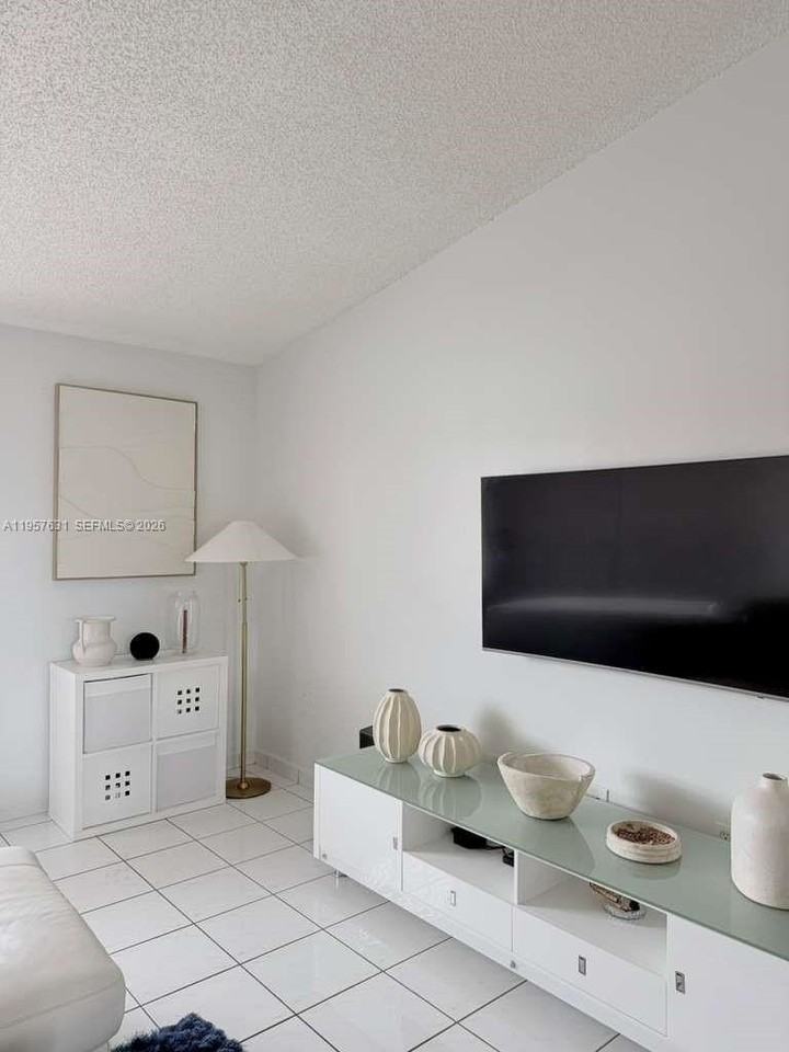 10017 W Okeechobee Rd #201 - Photo 5 of 34