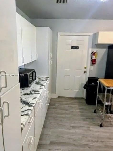 2953 Nw 10th Ct #MAIN - Photo 7 of 15